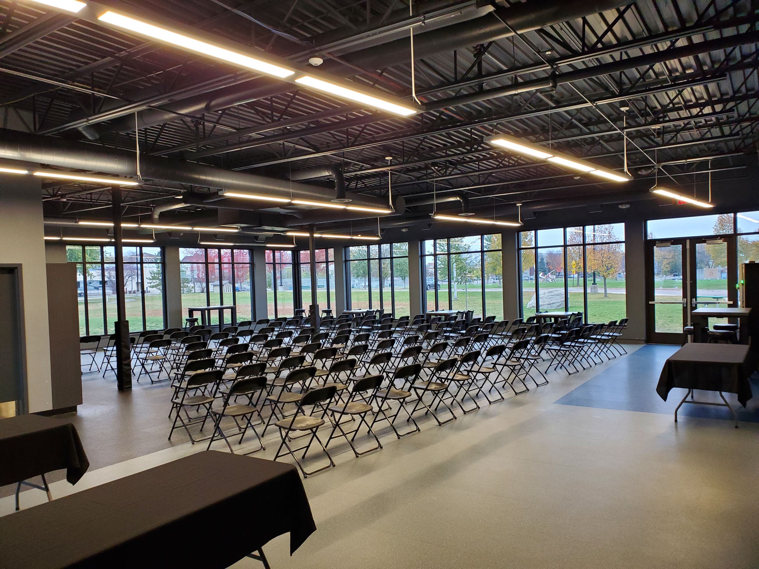 Chairs set up in rows in the Pavilion Warming House